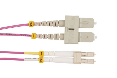 GROVE SC-LC 15M MM OM4 Duplex Patch Lead with LSZH jacket, aqua color, ideal for medium-range, high-speed fiber optic data transmission.