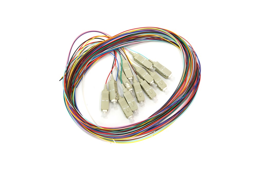 Pack of 12 SC multimode OM1 fibre optic pigtails, 2 m length each, colour‑coded, ideal for data centre and telecommunications splicing.