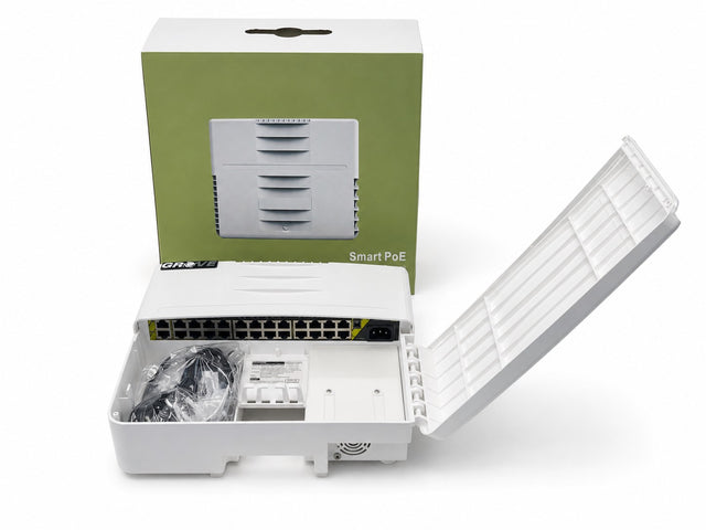 A white PoE switch with its protective lid open, showing the ports and accessories inside, positioned in front of its green and white retail packaging box on a white background.