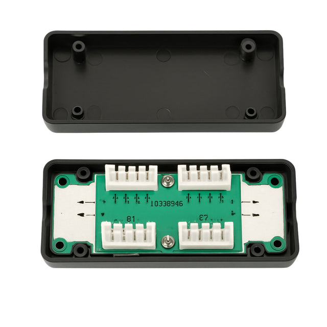 Electronic component with green circuit board and black housing on a white background